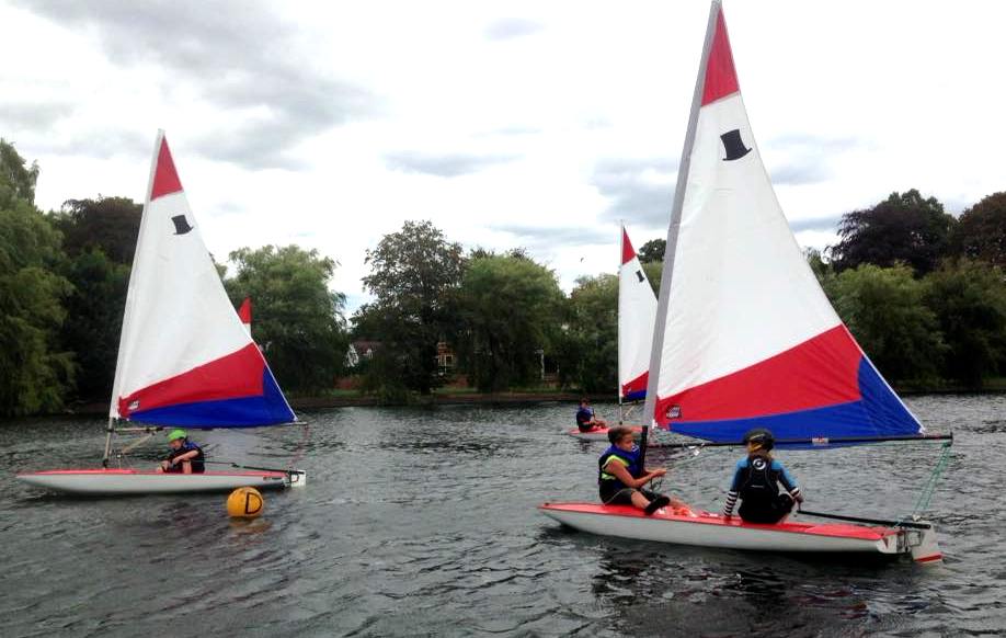Our young sailors enjoy coaching sessions using the club's fleet of Toppers.