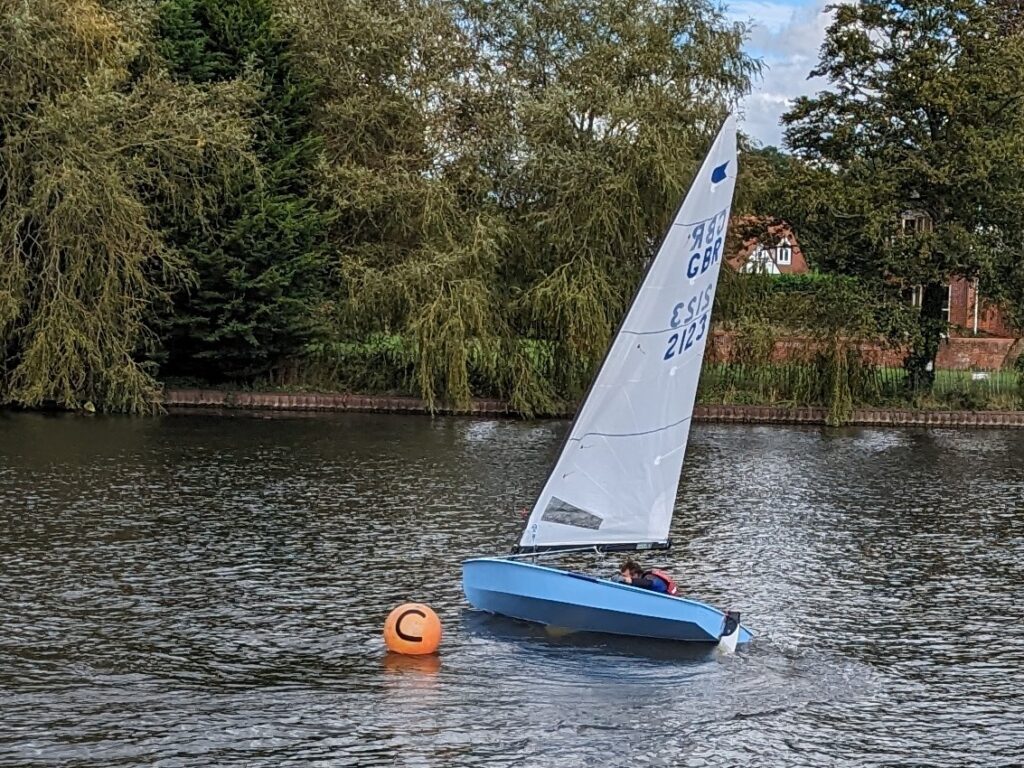 Dave Phillips (OK 2123) rounds the C buoy during the 2023 CRSC Veterans Cup